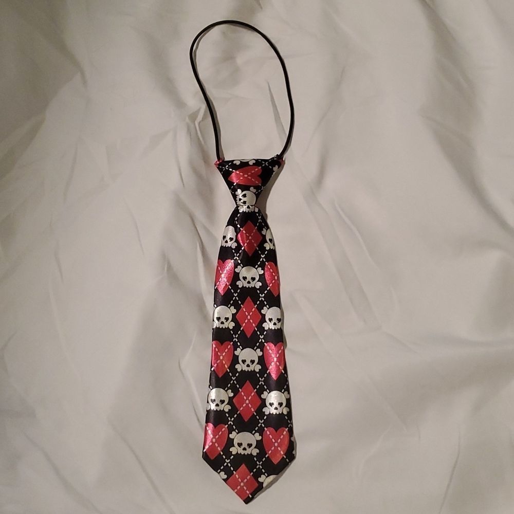 NEW PINK AND BLACK SKULLS TIE